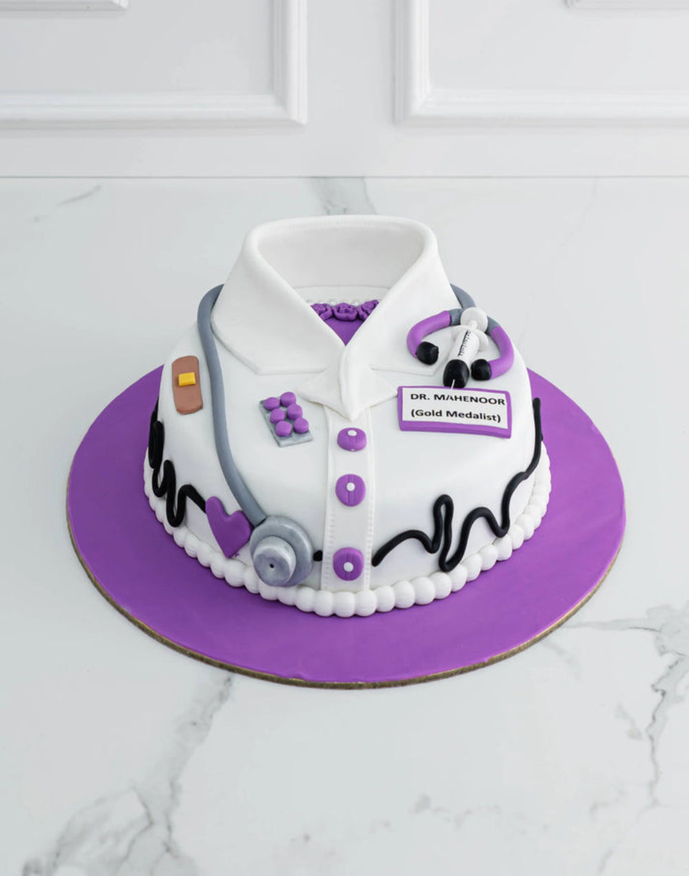 Doctor theme designer cake with stethoscope and medical details, perfect for celebrations and achievements in Delhi.