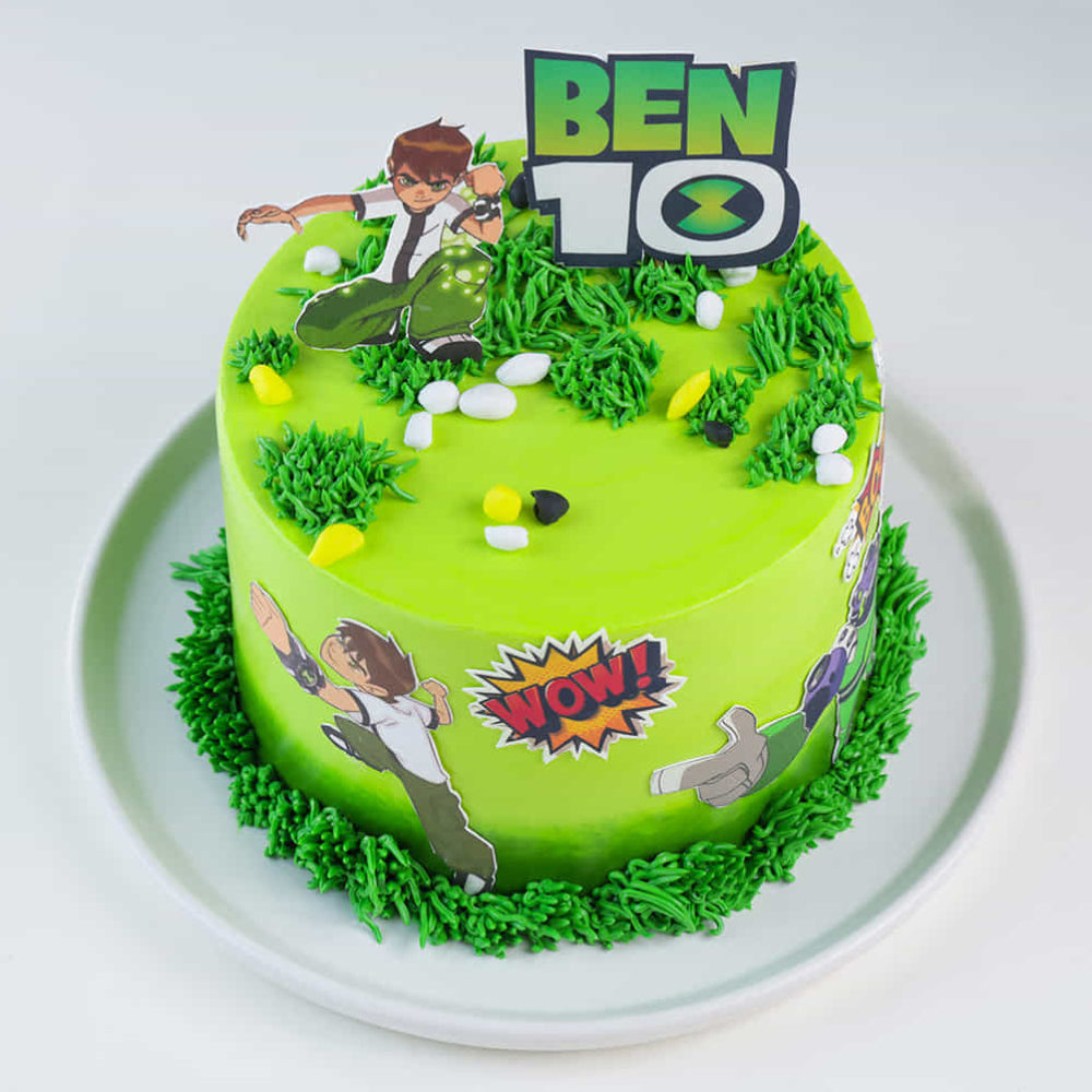 Ben 10 action-themed birthday cake with lime green frosting, edible "grass" textures, and vibrant character toppers. top view