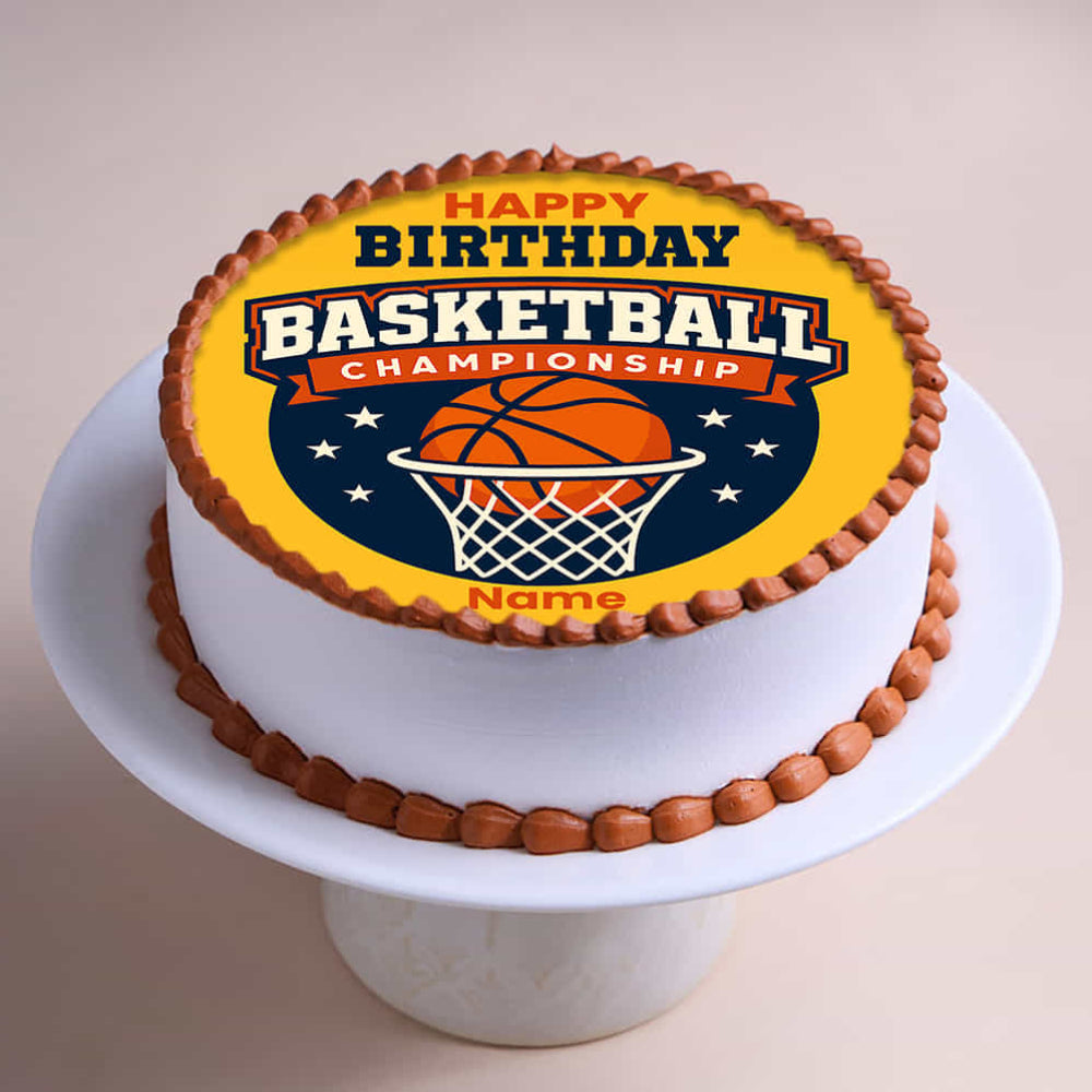 Birthday cake with basketball-themed decoration on a white stand