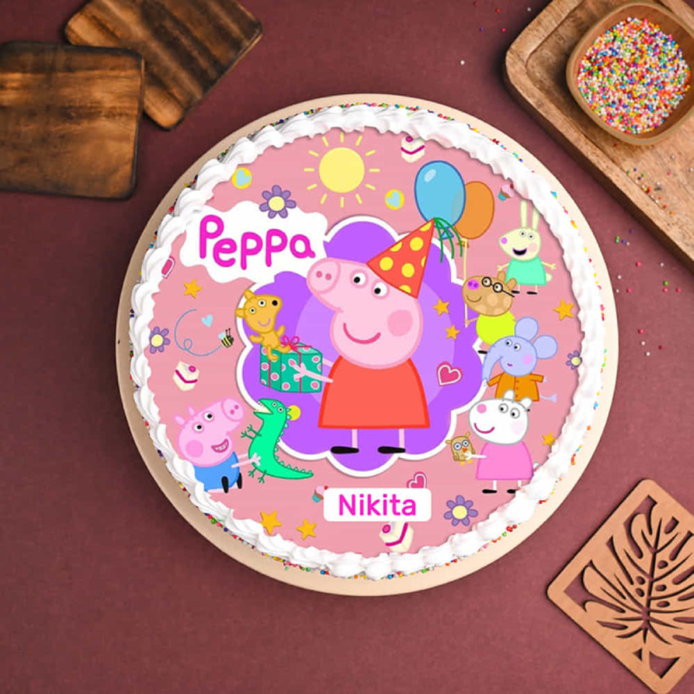 Peppa Pig themed personalized photo cake with colorful sprinkles and white frosting. top view