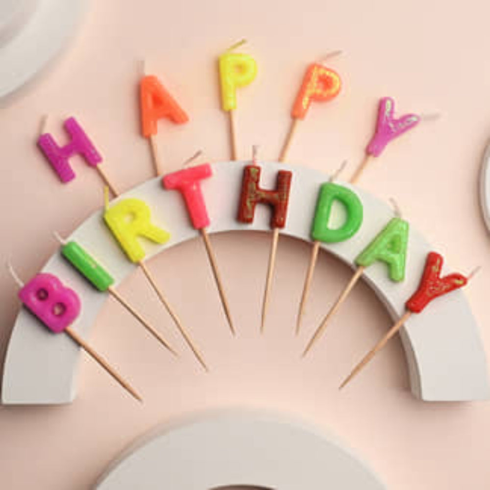 candle with message "happy birthday"