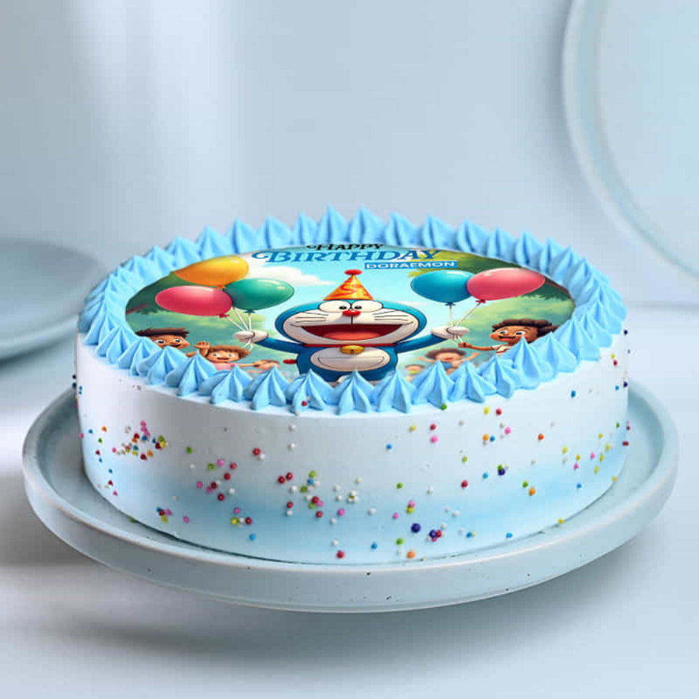 Birthday cake with cartoon character and colorful balloons on a white plate.