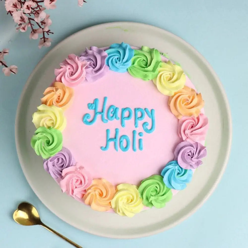 rainbow bliss holi celebration cake. top angle view. top view