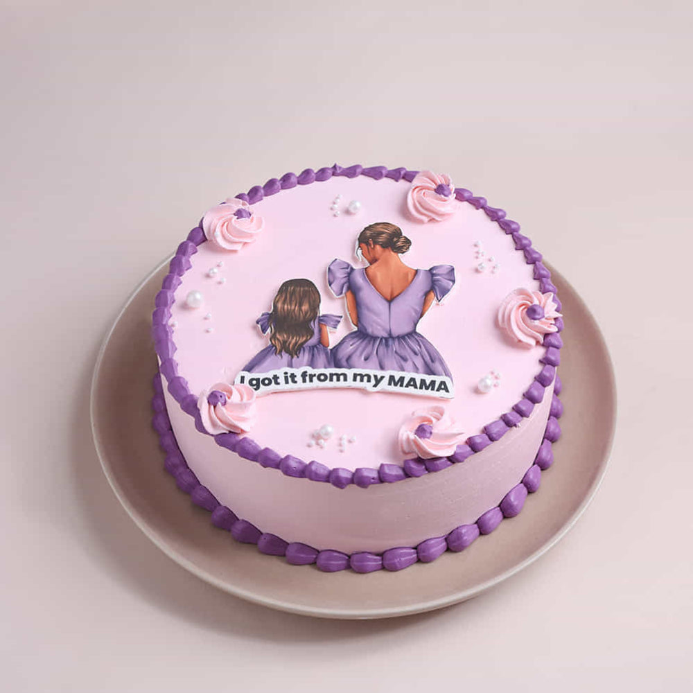 mother’s day cake with mother theme and pink purple design. top angle view