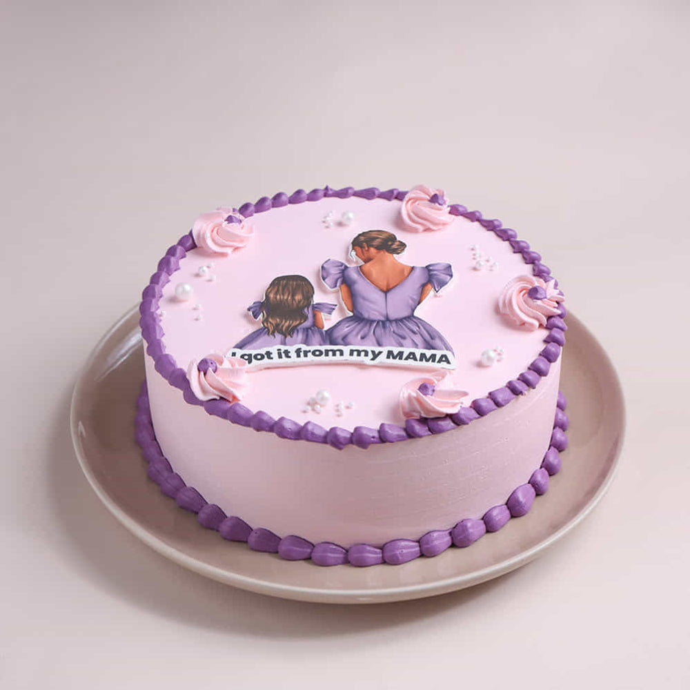 mother’s day cake with mama theme and pink purple design. top side view 