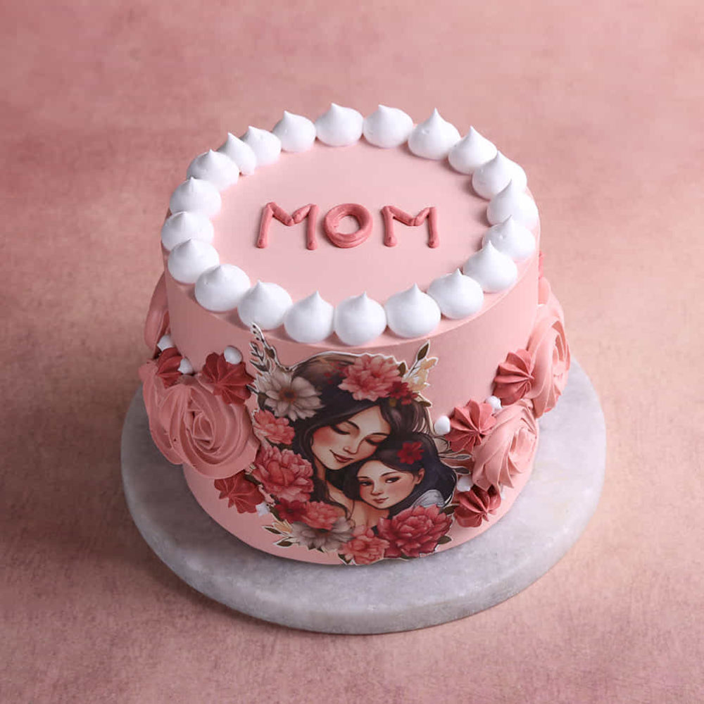 mother’s day cake with mom design and floral decoration. top angle view 